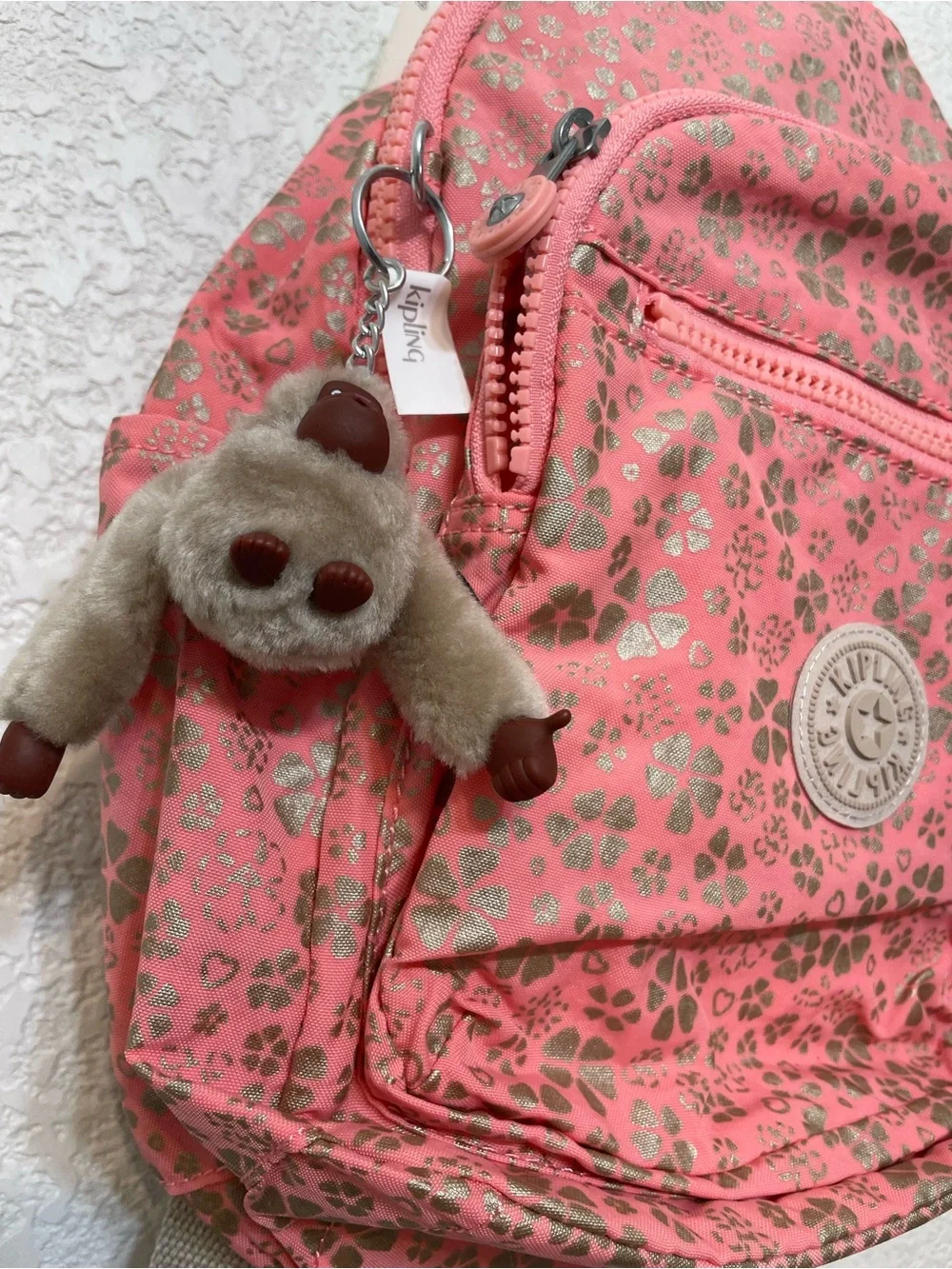 Kipling Pink Backpack with Gold Floral Print